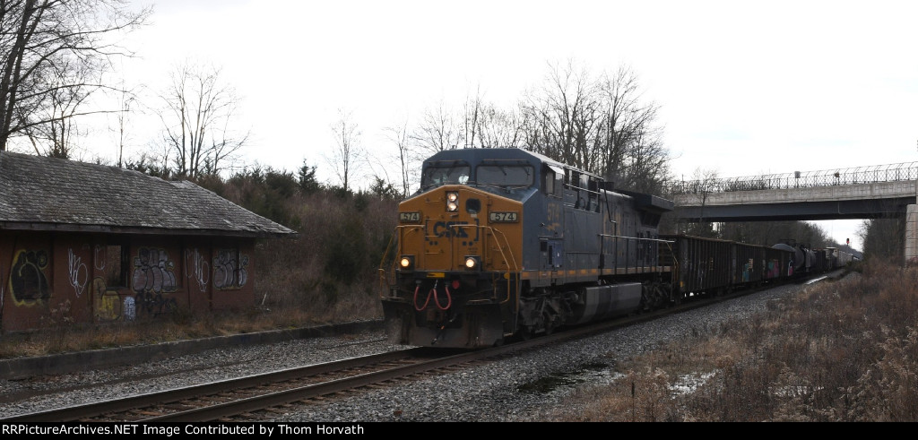 CSX M406 is eastbound past the former RDG passenger depot waiting building